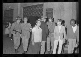 Fotografia "Conflitos' Conflitos - Passeatas - Polícia militar agride povo na Leopoldina - á favor das reformas de bases" ([Local n/d] , 1963) [negativo]. / Fotógrafo(a): Paulo; Venê; André; Alvaro; Pinto.  -- ITEM-0058.