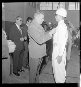 Fotografia "1- Páscoa dos surdos-mudos; 2- Reunião das Instituições de Previdência; 3- Condecoração de patrulheiros-mirins, [Reportagem?] com Celso Figueiredo" ([Local n/d] , [Data n/d]) [negativo]. / Fotógrafo(a): Orlando.  -- ITEM-0006.