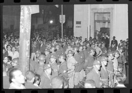 Fotografia "Conflitos' Conflitos - Passeatas - Polícia militar agride povo na Leopoldina - á favor das reformas de bases" ([Local n/d] , 1963) [negativo]. / Fotógrafo(a): Paulo; Venê; André; Alvaro; Pinto.  -- ITEM-0026.