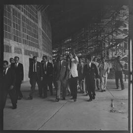 Fotografia "Visita do Lacerda ao Estádio do Maracanã c/ Antonio Carlos; LACERDA.. Carlos - visita Mstadio do Maracanã - para ver ver as obras - que foram iniciadas com Sete Camaras" ([Local n/d] , 1961) [negativo]. / Fotógrafo(a): Ribeiro.  -- ITEM-0001.