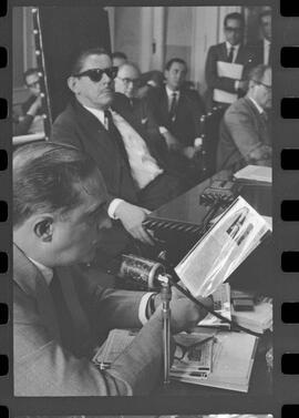 Fotografia "CPI [QUE] INVESTIGA ORGANISMO DE PRESSÃO AO CONGRESSO' C.P.I. Depoimento de Carlos Lacerda, Reportagem de Nelson Silva" ([Local n/d] , 1963) [negativo]. / Fotógrafo(a): Paulo Reis.  -- ITEM-0020.