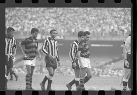 Fotografia "FUTEBOL = 'CAMPEONATO CARIOCA DE PROFISSIONAIS' Jogo Flamengo x Botafogo (3 x 1), America x Portuguesa (2 x 1), Madureira x Bangu (1 x 2), C. Grande x S. Cristovão (1 x 0) e C. Rio x Olaria (1 x 7), Reportagem de Esporte" ([Local n/d] , 1963) [negativo]. / Fotógrafo(a): Equipe.  -- ITEM-0061.