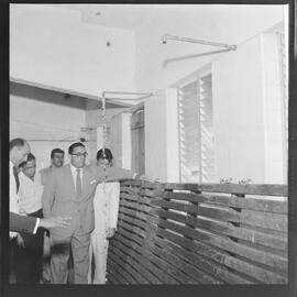Fotografia "Visita do Lacerda ao Estádio do Maracanã c/ Antonio Carlos; LACERDA.. Carlos - visita Mstadio do Maracanã - para ver ver as obras - que foram iniciadas com Sete Camaras" ([Local n/d] , 1961) [negativo]. / Fotógrafo(a): Ribeiro.  -- ITEM-0006.