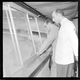 Fotografia "Visita do Lacerda ao Estádio do Maracanã c/ Antonio Carlos; LACERDA.. Carlos - visita Mstadio do Maracanã - para ver ver as obras - que foram iniciadas com Sete Camaras" ([Local n/d] , 1961) [negativo]. / Fotógrafo(a): Ribeiro.  -- ITEM-0011.