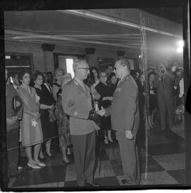 Fotografia "Ministério da Guerra' Entrega de Espadas aos novos generais. Alfredo Pinheiro, Joaquim de Melo Camarinha, Napoleão Nobre e Luis Lopes de Miranda etc...com a presença do Gal. José Machado Lopes), Reportagem de Sonia" ([Local n/d] , 1963) [negativo]. / Fotógrafo(a): Rodolpho.  -- ITEM-0012.