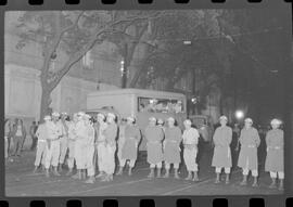 Fotografia "Conflitos' Conflitos - Passeatas - Polícia militar agride povo na Leopoldina - á favor das reformas de bases" ([Local n/d] , 1963) [negativo]. / Fotógrafo(a): Paulo; Venê; André; Alvaro; Pinto.  -- ITEM-0049.