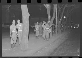 Fotografia "Conflitos' Conflitos - Passeatas - Polícia militar agride povo na Leopoldina - á favor das reformas de bases" ([Local n/d] , 1963) [negativo]. / Fotógrafo(a): Paulo; Venê; André; Alvaro; Pinto.  -- ITEM-0086.