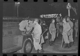 Fotografia "Conflitos' Conflitos - Passeatas - Polícia militar agride povo na Leopoldina - á favor das reformas de bases" ([Local n/d] , 1963) [negativo]. / Fotógrafo(a): Paulo; Venê; André; Alvaro; Pinto.  -- ITEM-0066.